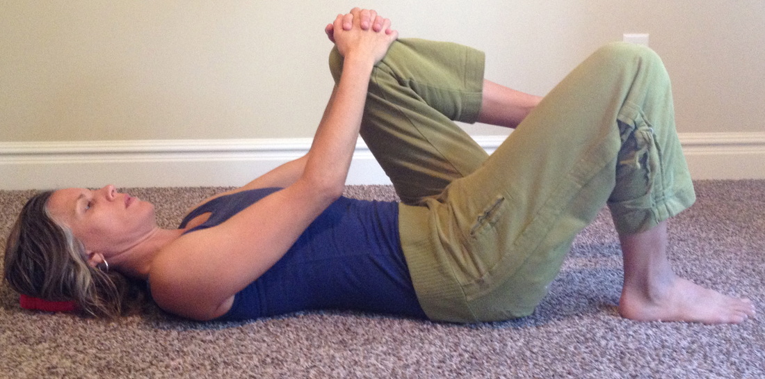 Knee to chest stretch with bent knee